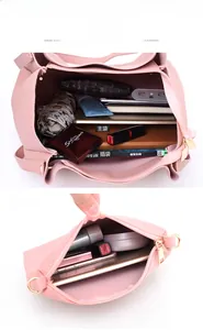 Internal view of pink tote bag showing large capacity for laptop and daily essentials