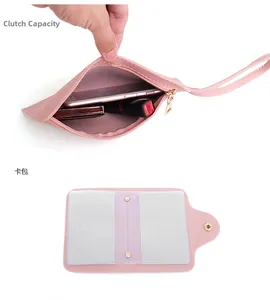 Detail of light pink leather clutch bag and card holder showing interior storage capacity