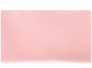 Detailed close-up of pink Saffiano leather texture showing cross-hatch grain pattern