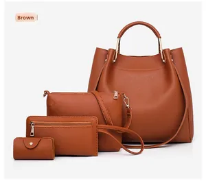Detailed set of 4 brown Saffiano leather bags with elegant golden hardware accents