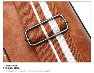 Close-up of the adjustable orange striped fabric strap and metal buckle for bucket bag