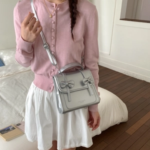 Bolso de hombro plateado de piel PU metalizada con lazos dobles estilo universitario