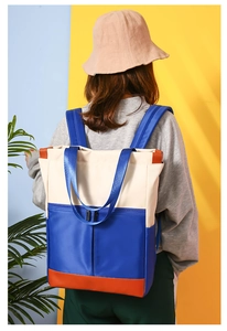 Outdoor waterproof nylon backpack with color-block design and adjustable blue straps
