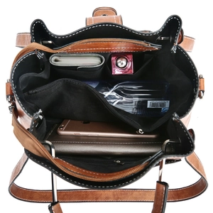 Brown leather bucket bag with internal compartments, showing storage for phone and wallet