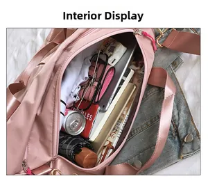 Interior view of pink large capacity fitness bag showing organized storage space