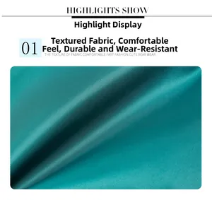 Macro shot of durable teal waterproof nylon fabric with fine twill texture and glossy finish