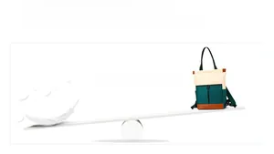 Creative scene showing lightweight nylon backpack on a scale balanced with a single feather