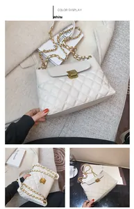 Detailed close-up showing the white quilted PU leather texture and gold chain strap of the bag