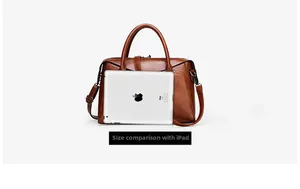 Brown leather tote bag size comparison with an iPad showing large storage capacity