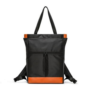 Waterproof nylon convertible backpack and handbag in black with bright orange contrast trim