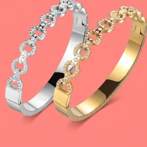 Luxe interlocking link chain bracelets in gold and silver finish with pave zircons