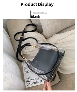 Detail of 2-in-1 transparent PVC jelly bag with black leather inner pouch and strap