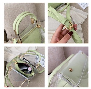 Detail view of transparent mint green jelly bag showing inner PU pouch and metal handle