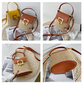 Detail of straw bucket bag featuring leather flap and gold vintage hardware buckle