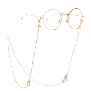 Lunettes rondes dorées avec pendentif cœur strass infini et chaîne en métal