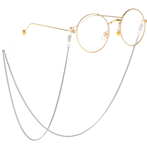 Silver stainless steel eyeglass chain with round gold metal frame glasses on white back