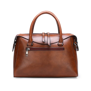 Dark brown faux leather handbag with crocodile pattern and dual round top handles