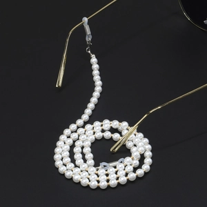 70cm pearl eyewear chain with white beads and golden metal spacers in spiral layout