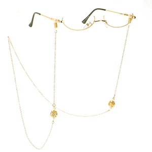 Chaîne de lunettes dorée avec strass et perles sur monture demi-cerclée chic