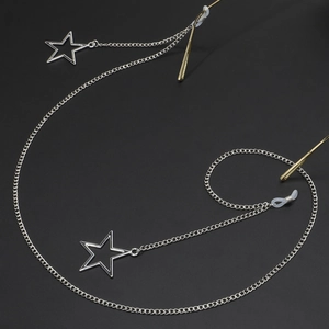Chaîne à lunettes en métal argenté avec pendentifs étoile et boucles en silicone réglables