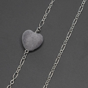 Silver Figaro chain glasses strap featuring a soft grey flocked heart pendant charm