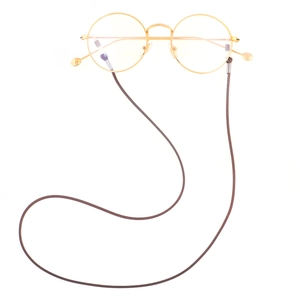 Close-up of retro gold round glasses with a dark brown braided wax rope strap detail