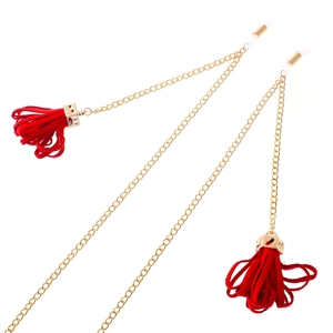 Golden metal eyewear chain with red suede tassels and clear rubber non-slip loops