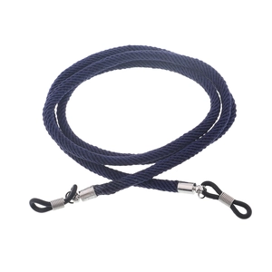 Detail of navy blue braided sport eyewear retainer with adjustable black rubber loops