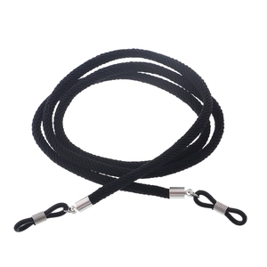 Detailed view of black woven sports eyewear strap with silver metal adjusters and silicone loops