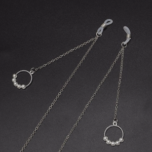 Silver metal eyewear chain with white pearl pendants and non-slip silicone loops