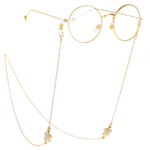 Chaîne de lunettes dorée avec pendentifs tortues en strass sur lunettes rondes