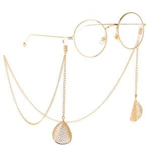 Chaîne de lunettes dorée avec pendentifs feuilles évidées et monture ronde en métal