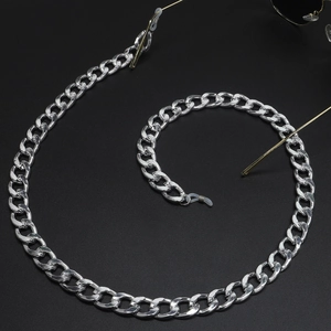Detail of silver curb chain glasses strap with clear anti-slip silicone loop connectors