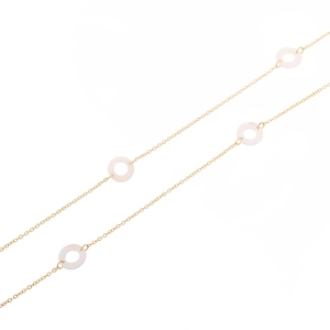 Golden sun glass chain with white shell rings in a minimalist geometric jewelry design