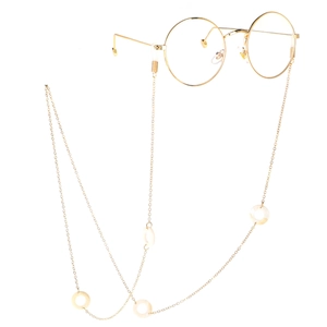 Round gold frame sunglasses with silver shell accent eyewear chain holder for women
