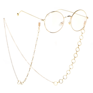 Lunettes rondes dorées avec chaîne décorative à anneaux multiples en métal brillant