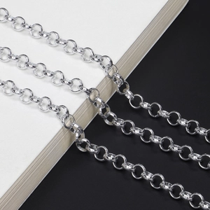 Polished silver metal eyewear chain with thick round links on a contrast background