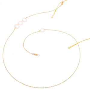 Minimalist gold sunglasses chain with round pink resin accents and adjustable rubber loops
