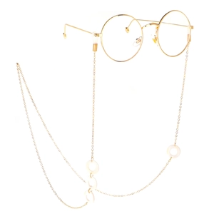 Elegant gold round glasses with matching shell bead chain strap in a minimalist style