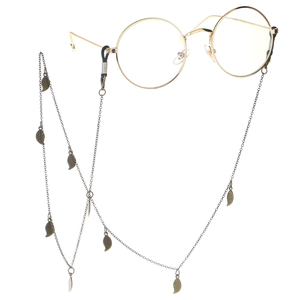 Chaîne de lunettes vintage avec pendentifs feuilles de bronze et cordon en métal doré