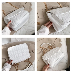 Detailed views of white quilted chain bag with V-stitch pattern and gold metal strap