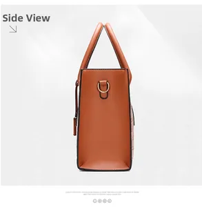 Side view detail of a brown leather tote bag with gold D-ring and smooth texture