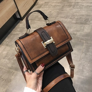 Vintage brown oil wax leather crossbody bag with flap and gold hardware buckle