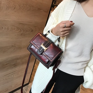 Vintage burgundy square shoulder bag with gold metal clasp and textured oil wax finish