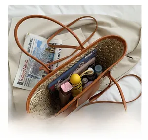 Top view of woven straw beach bag showing large inner capacity for daily essentials