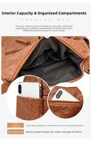 Detailed interior of brown vintage shoulder bag showing multiple compartments and storage space