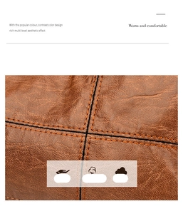 Macro shot of brown leather texture with contrast orange double stitching detail