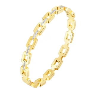 Detail of gold link bracelet with micro-pave white zircon stones and high-polish finish