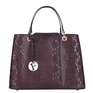 Glossy burgundy faux snake pattern handbag with elegant gold handles and F pendant