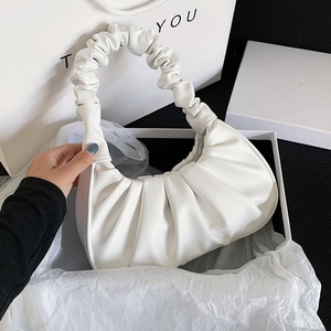 Chic white pleated dumpling hobo bag with matching ruched handle on luxury gift packaging